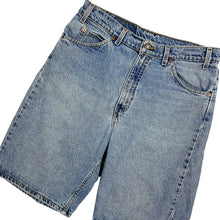 Load image into Gallery viewer, Levi’s 550 Orange Tab Denim Shorts - Size 33”
